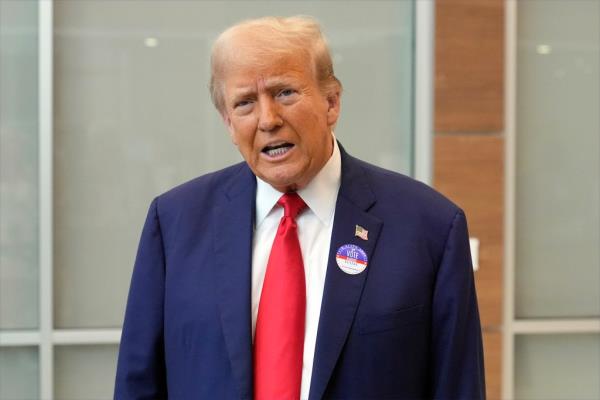 Former President Donald Trump speaking at the Palm Beach County Supervisor of Elections in West Palm Beach, Florida, voting early in the 2024 Florida primary.